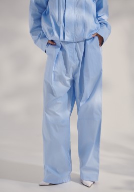 A long-Sleeve Bomber Jacket Paired With Wide-Leg Pants