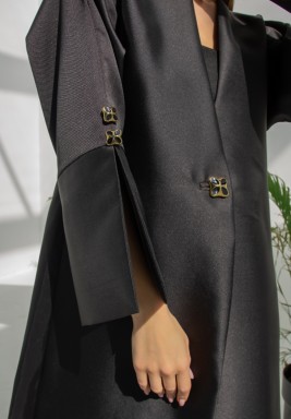 Mikado Abaya with Slitted Sleeve Secured by Gold and Black Floral button