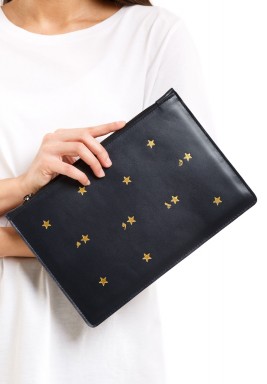 حقيبة يد سوداء بنجوم فضية