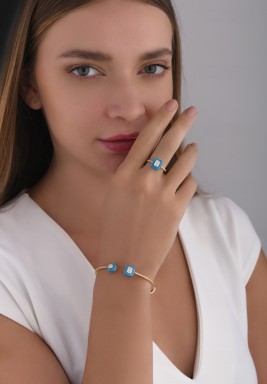 طقم راديانت ترانكيل - ذهبي مرصع بحجر أزرق